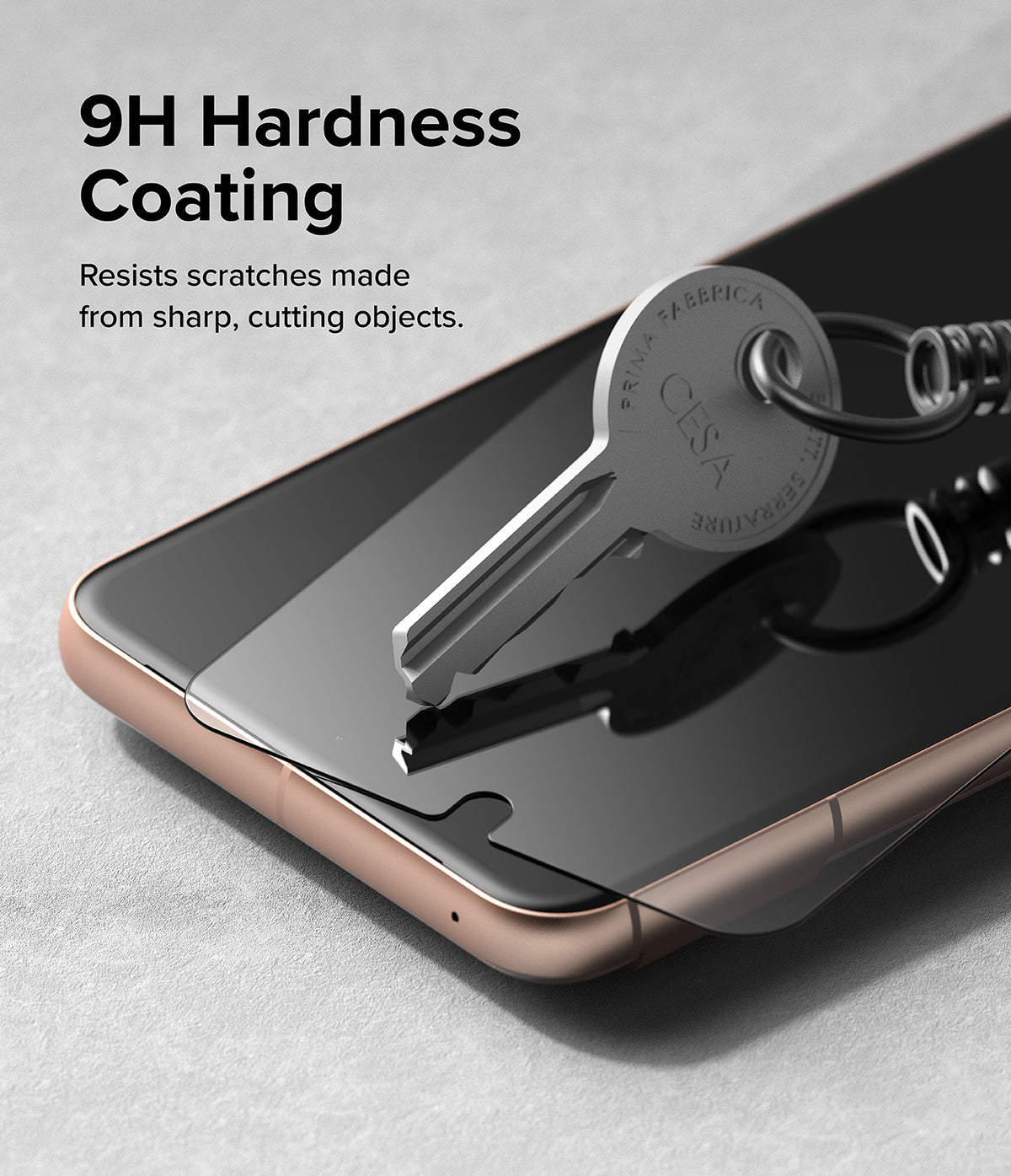 Google Pixel 8 Screen Protector | Glass - Google Pixel 8 Screen Protector - A metal key pressing against a tempered glass screen protector on a smartphone.