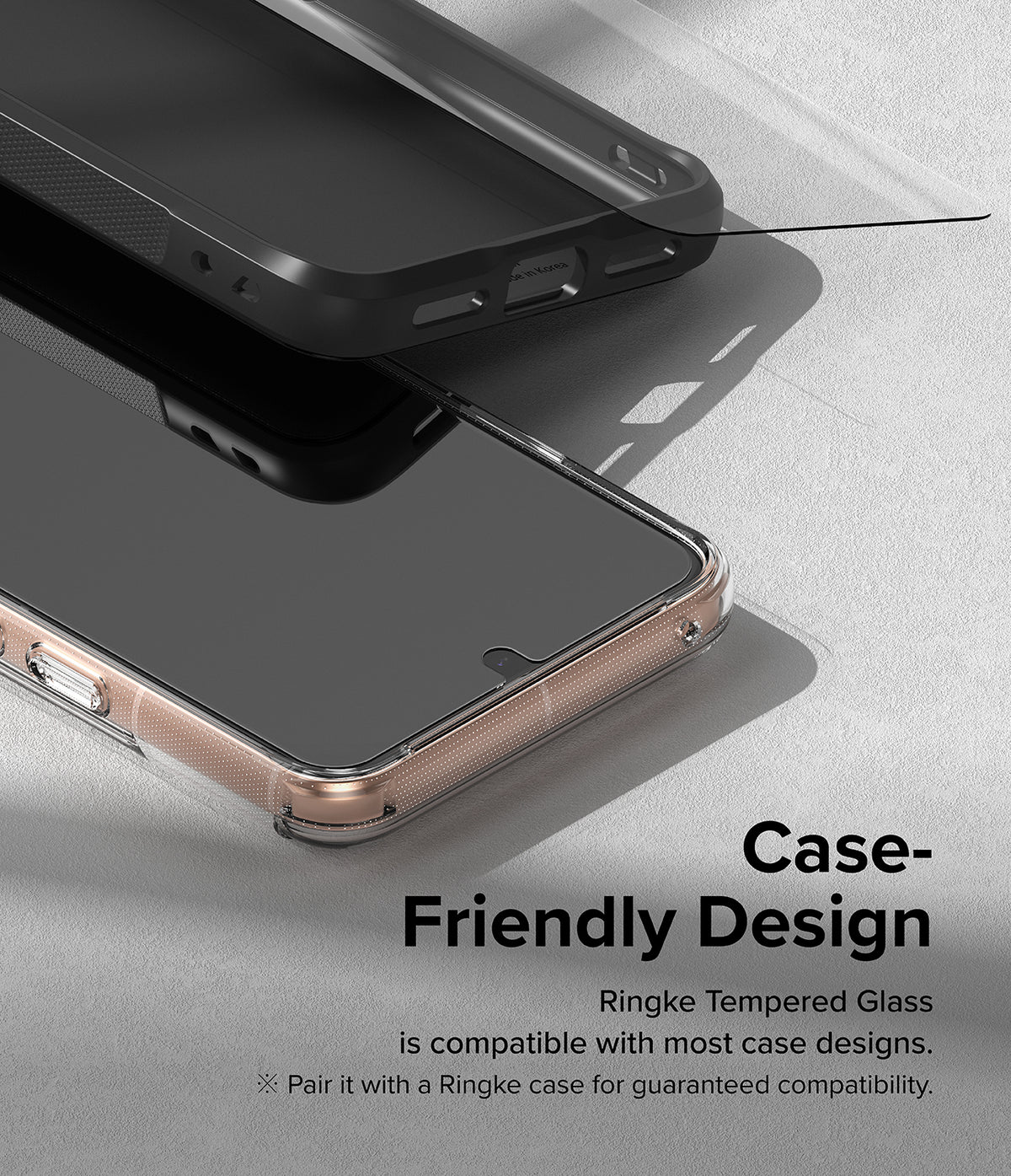Google Pixel 8 Screen Protector | Glass - Tempered glass screen protector hovering above a phone in a protective case.