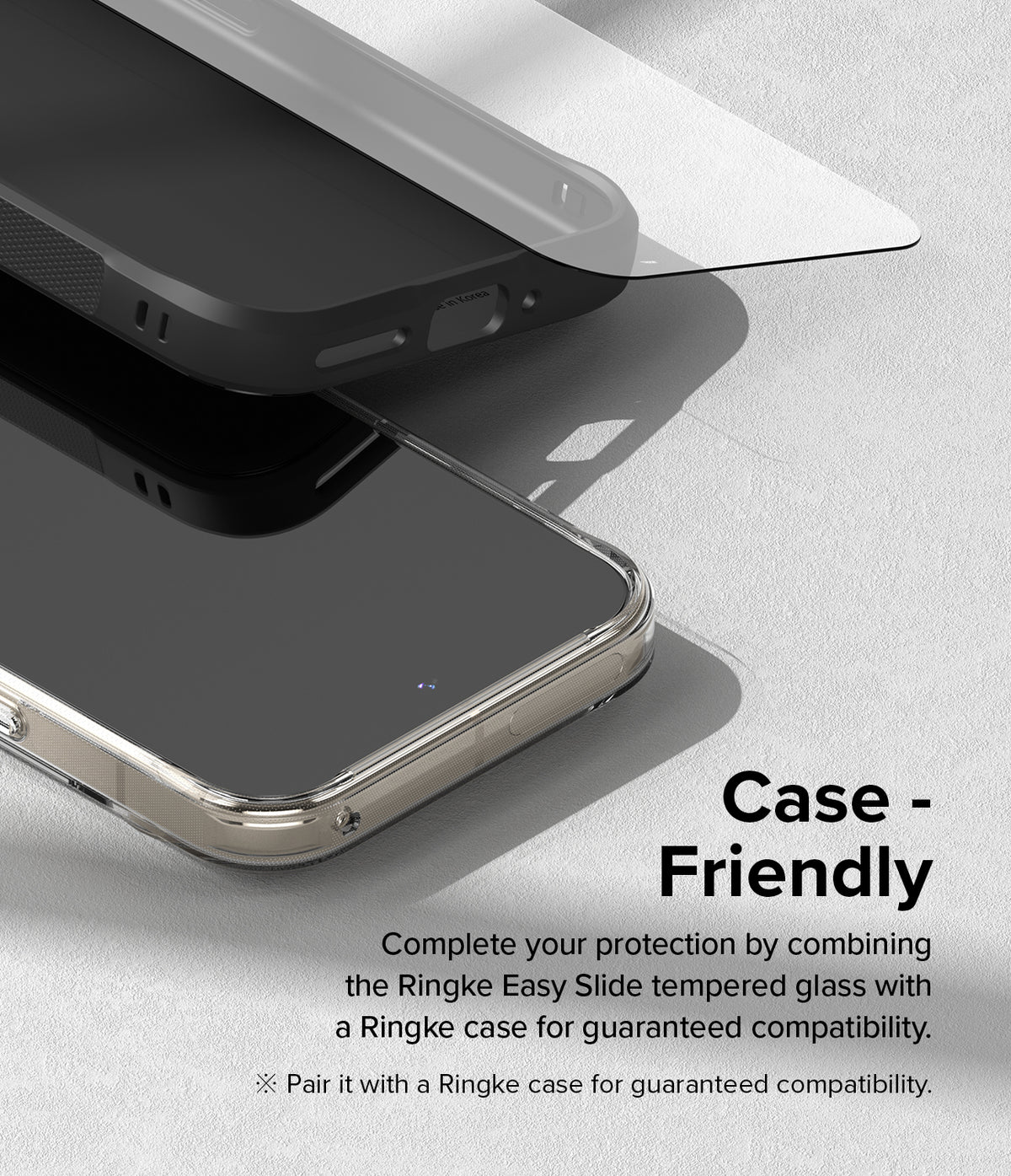 Google Pixel 9 Pro XL Screen Protector | Easy Slide Tempered Glass - Google Pixel 9 Pro XL Screen Protector - Tempered glass screen protector hovering above a smartphone inside a protective case.
