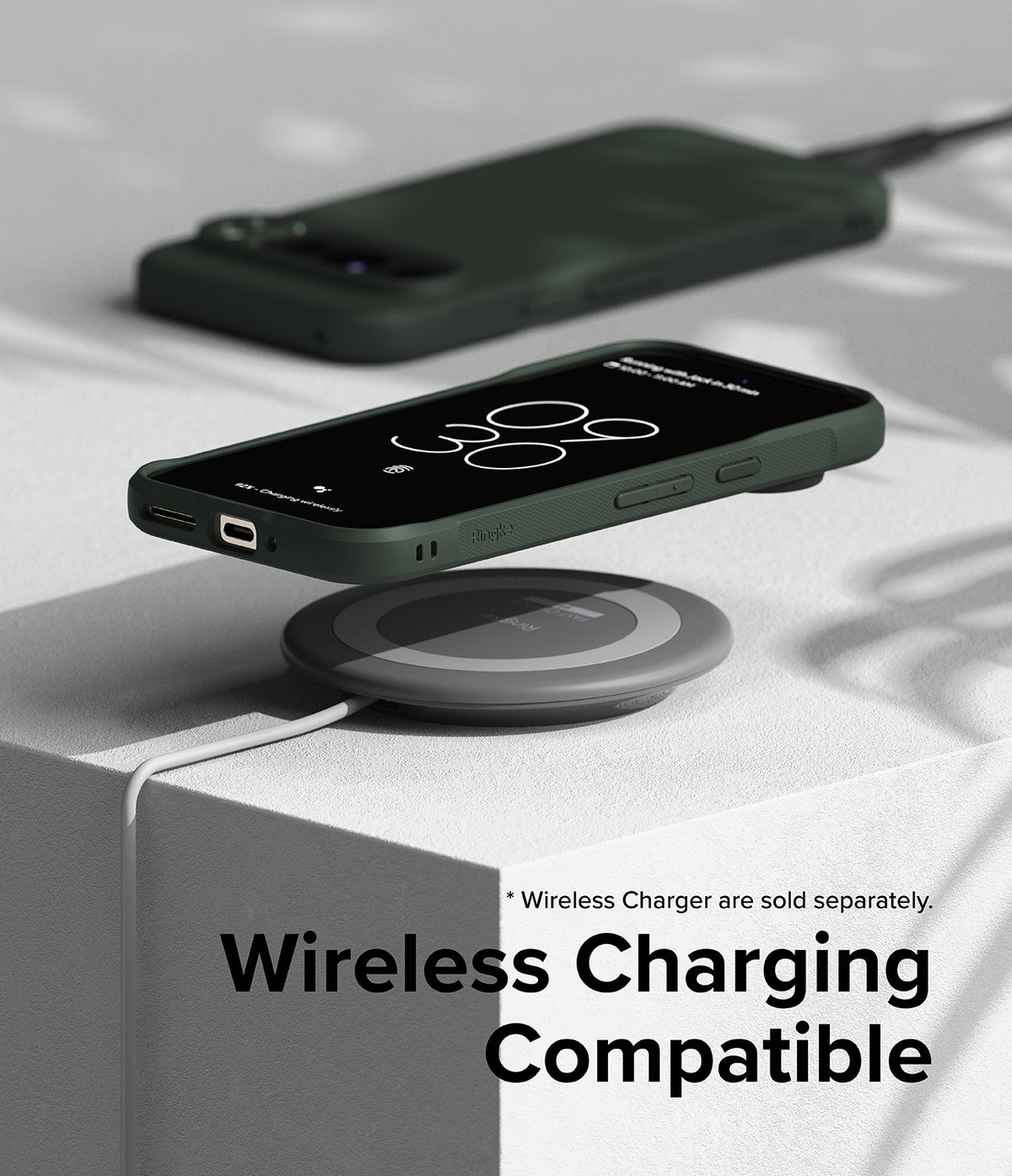 Google Pixel 9 Pro Case | Onyx - Onyx phone case on a Google Pixel 9 Pro hovering above a wireless charging pad.