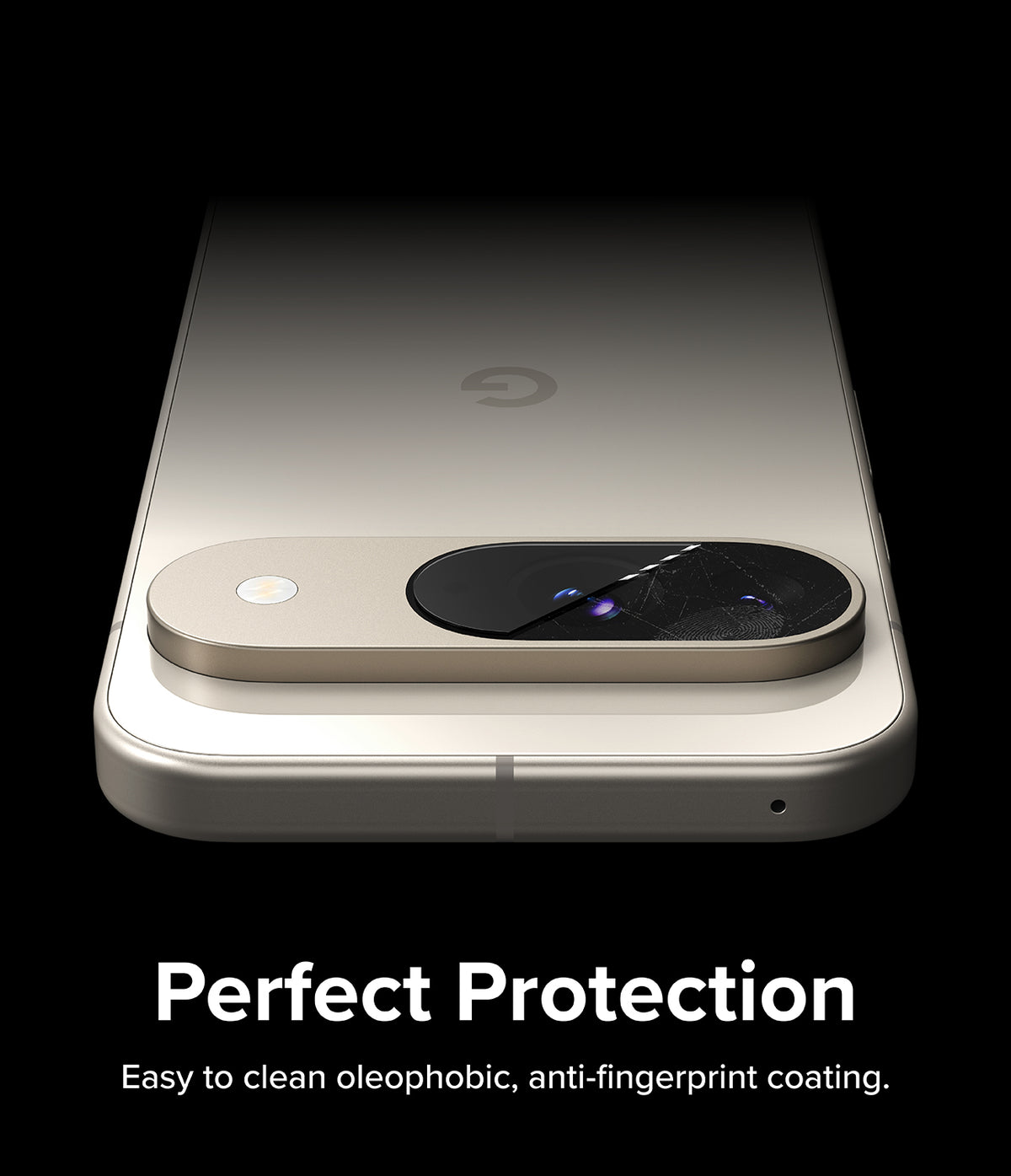 Google Pixel 9 | Camera Glass - Close-up of a phone camera lens protector showing a fingerprint being wiped away.