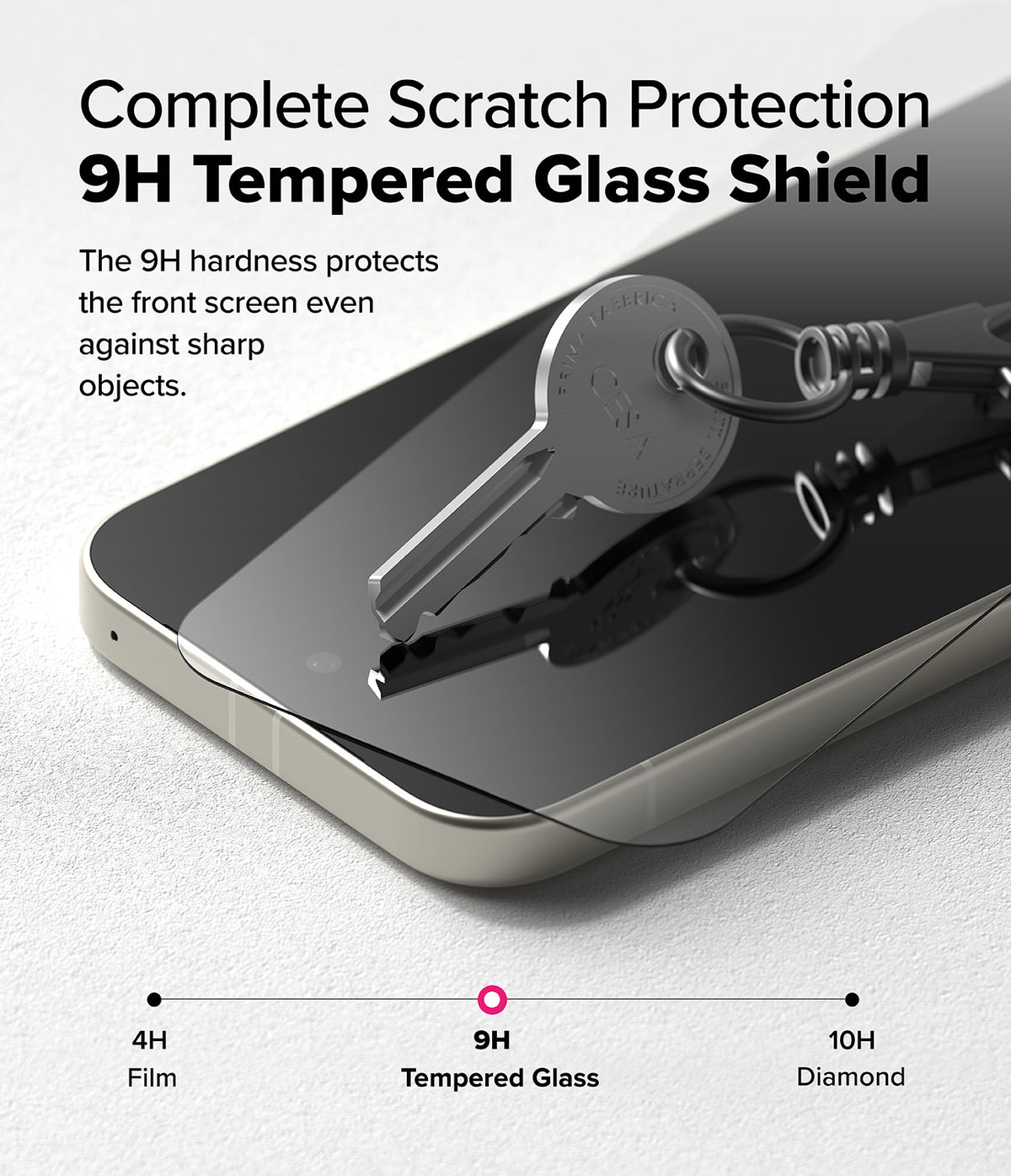 Google Pixel 9a Screen Protector | Easy Slide Tempered Glass - Google Pixel 9a Screen Protector - A metal key resting on a phone screen protector, demonstrating 9H scratch resistance.