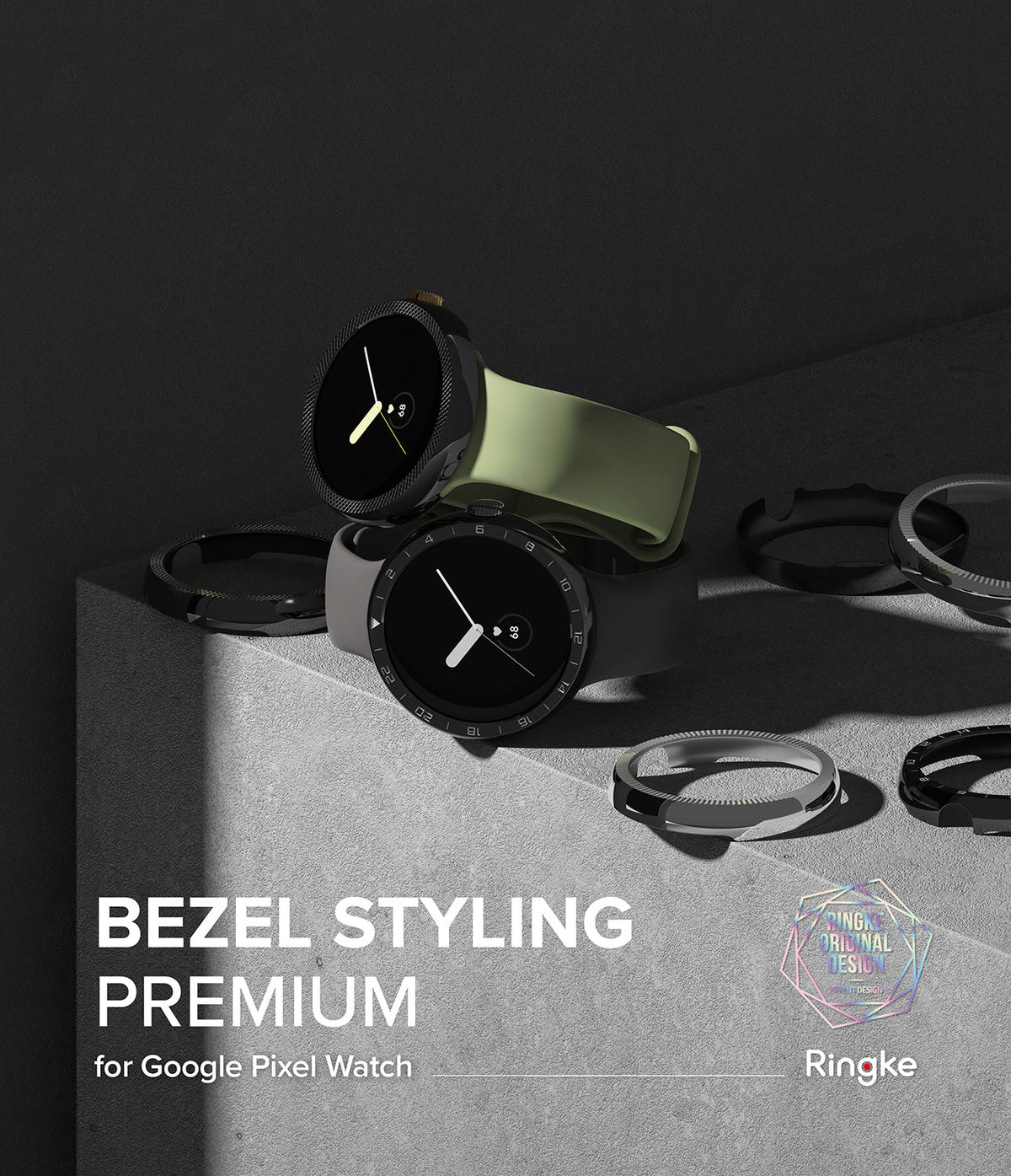 Google Pixel Watch 41mm | Premium Bezel Styling - Two Google Pixel watches with different bezel covers and bands on a concrete surface.