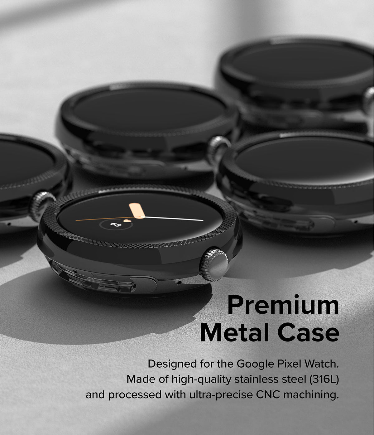 Google Pixel Watch 41mm | Premium Bezel Styling - Multiple black stainless steel watch cases arranged on a textured surface.