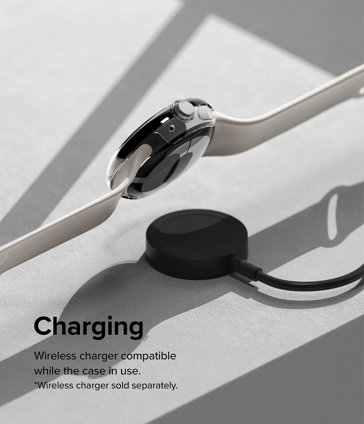 Google Pixel Watch Case | Slim - A clear protective case on a Pixel Watch resting on a wireless charging puck.