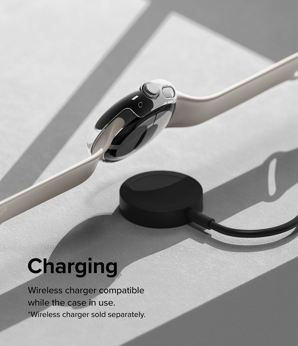 Google Pixel Watch Case | Slim - A Pixel Watch with a clear slim case hovering above a black wireless charging puck.