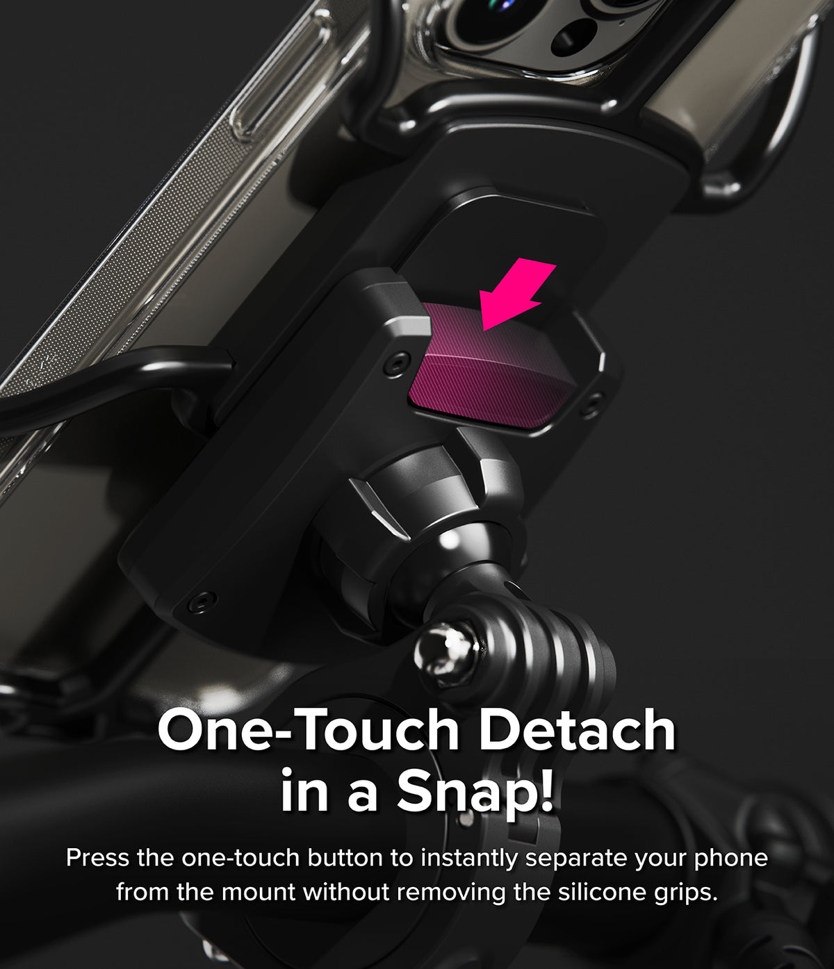 Quick & Go | Grip Bike Mount - Close-up of a finger pressing a pink button on a bike phone mount to detach the device.