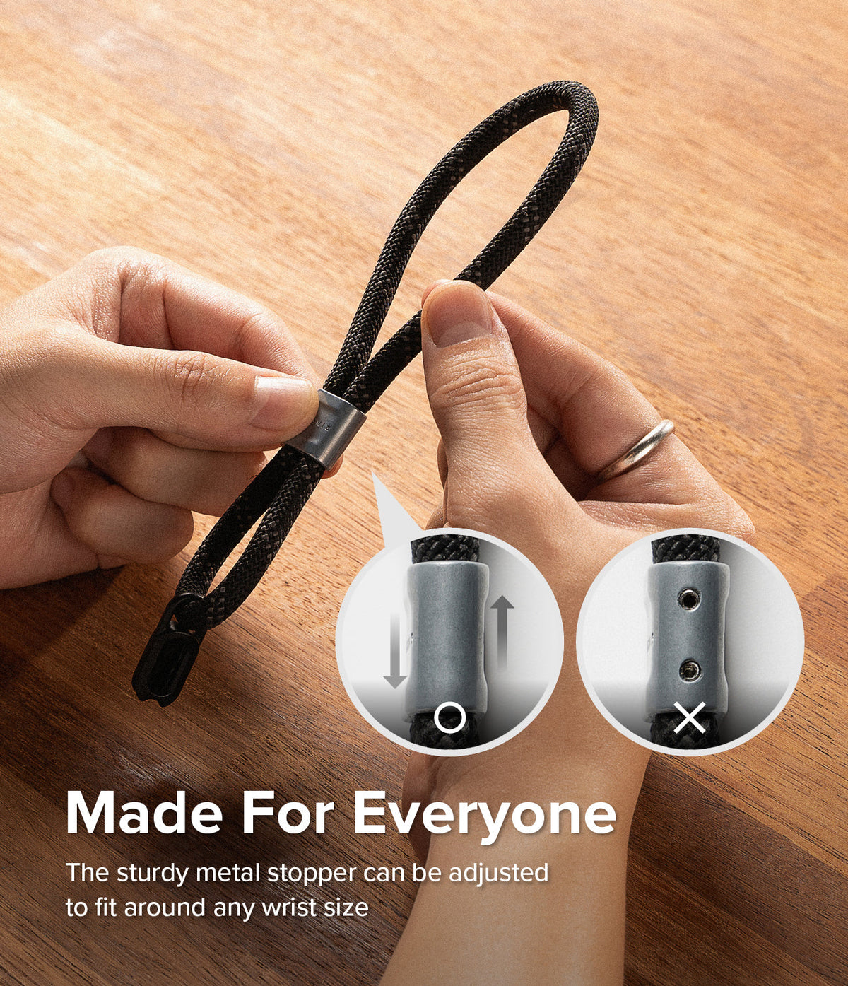 Rope Hand Strap - Hands adjusting a black rope strap with a metal stopper, showing correct and incorrect sliding positions.