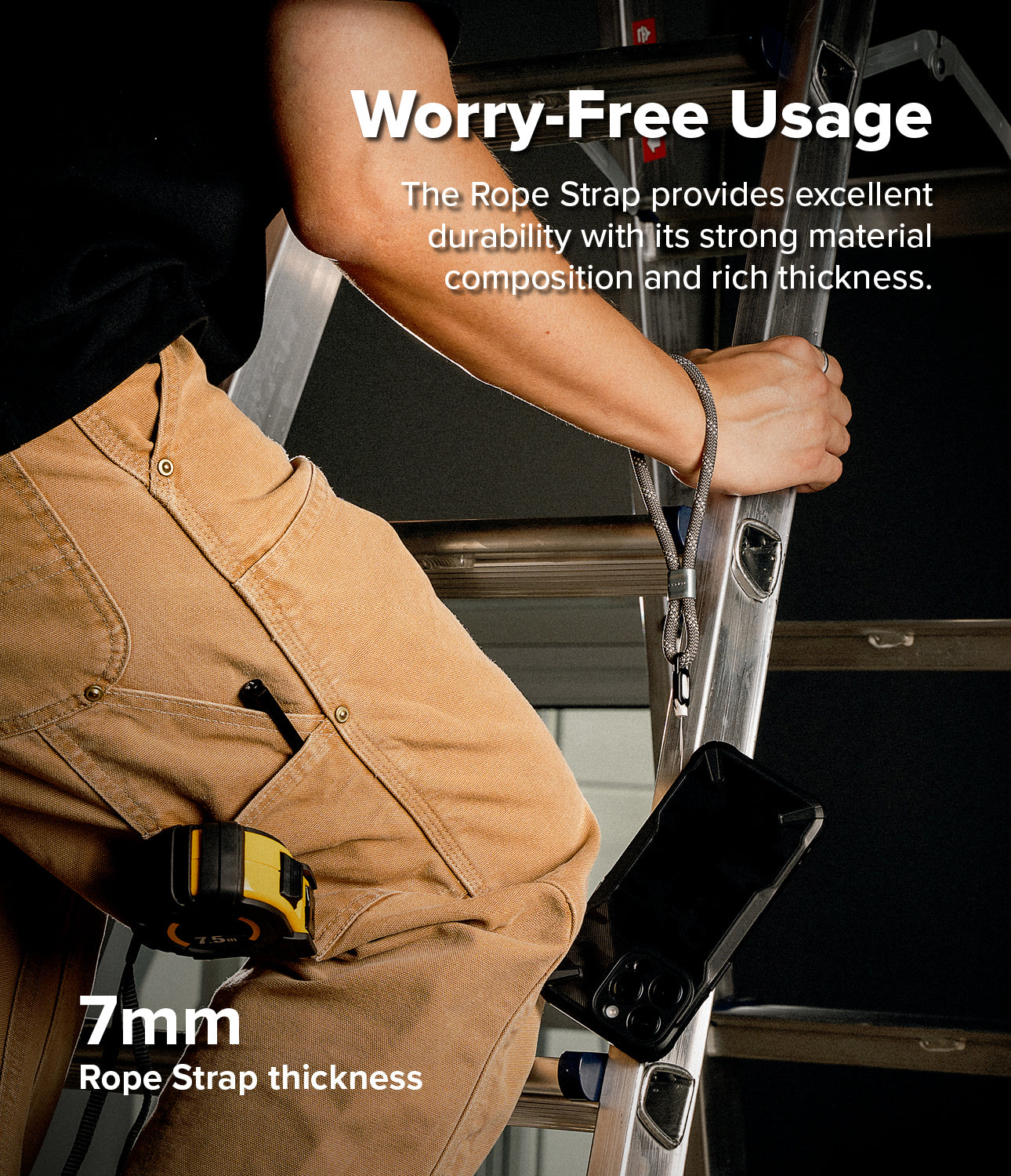 Rope Hand Strap - A person on a ladder wearing a thick gray rope wrist strap attached to a smartphone.