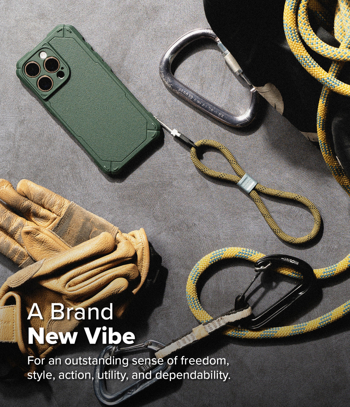 Rope Hand Strap - Green phone case with a yellow rope wrist strap, leather gloves, and carabiners on a grey surface.