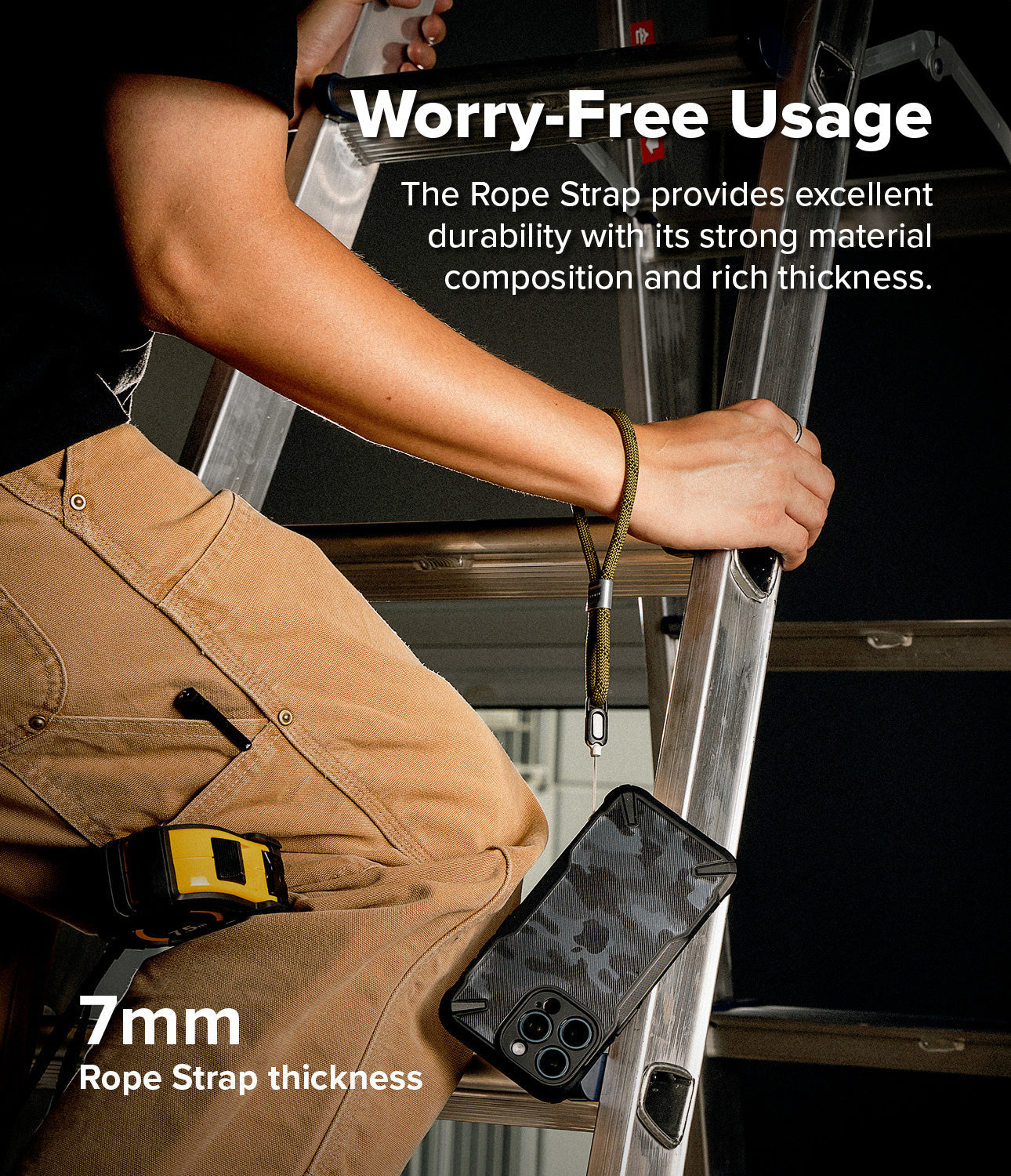 Rope Hand Strap - A person on a ladder wearing a thick olive green rope wrist strap attached to a smartphone case.