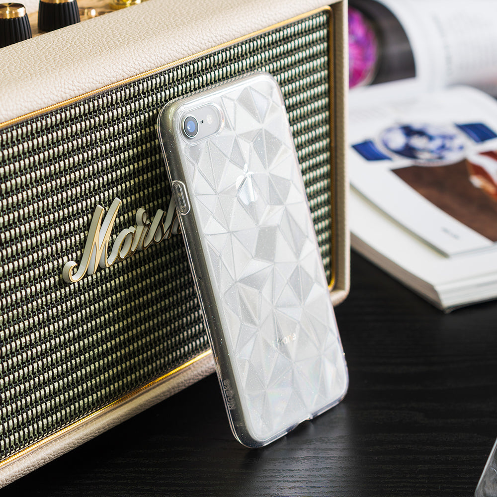 iPhone 8 / 7 Case | Air Prism - Clear, glittery phone case with a geometric prism pattern leaning against a vintage-style speaker.