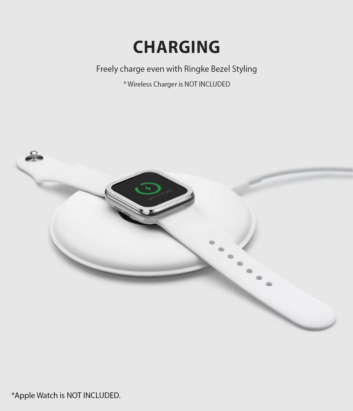 Apple Watch Series 3 / 2 / 1 (38mm) | Premium Bezel Styling H - Apple Watch with silver bezel styling charging on a pad.