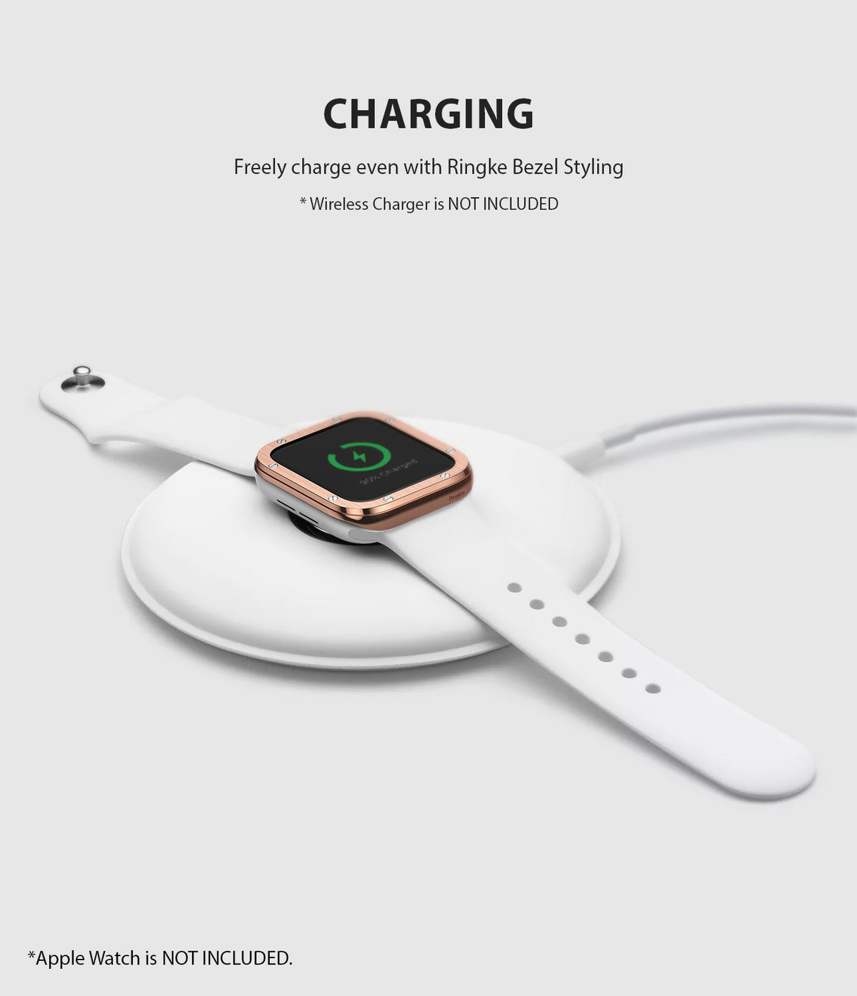 Apple Watch Series 3 / 2 / 1 (38mm) | Premium Bezel Styling H - Apple Watch with rose gold bezel styling charging on a pad.