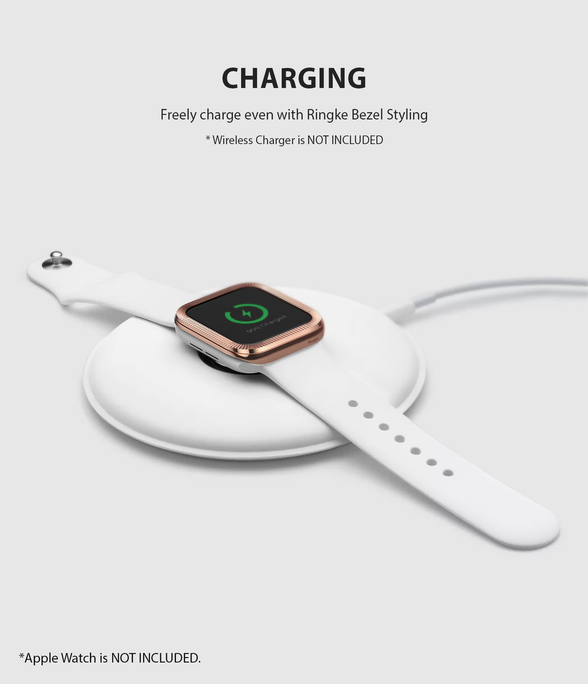 Apple Watch Series 3 / 2 / 1 (38mm) | Premium Bezel Styling O - White Apple Watch with rose gold bezel charging on a pad.