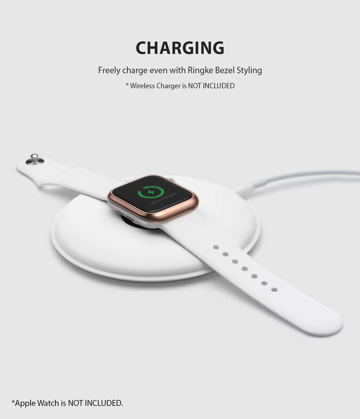 Apple Watch Series 6 / 5 / 4 / SE (40mm) | Bezel Styling - Apple Watch with rose gold bezel charging on a white pad.