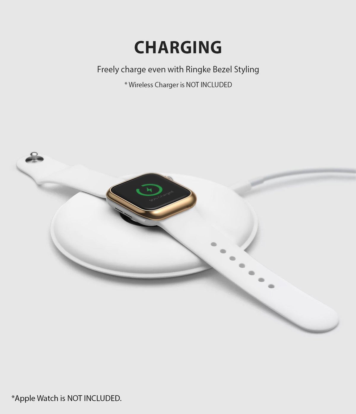 Apple Watch Series 6 / 5 / 4 / SE (40mm) | Bezel Styling - Apple Watch with gold bezel styling charging on a pad.