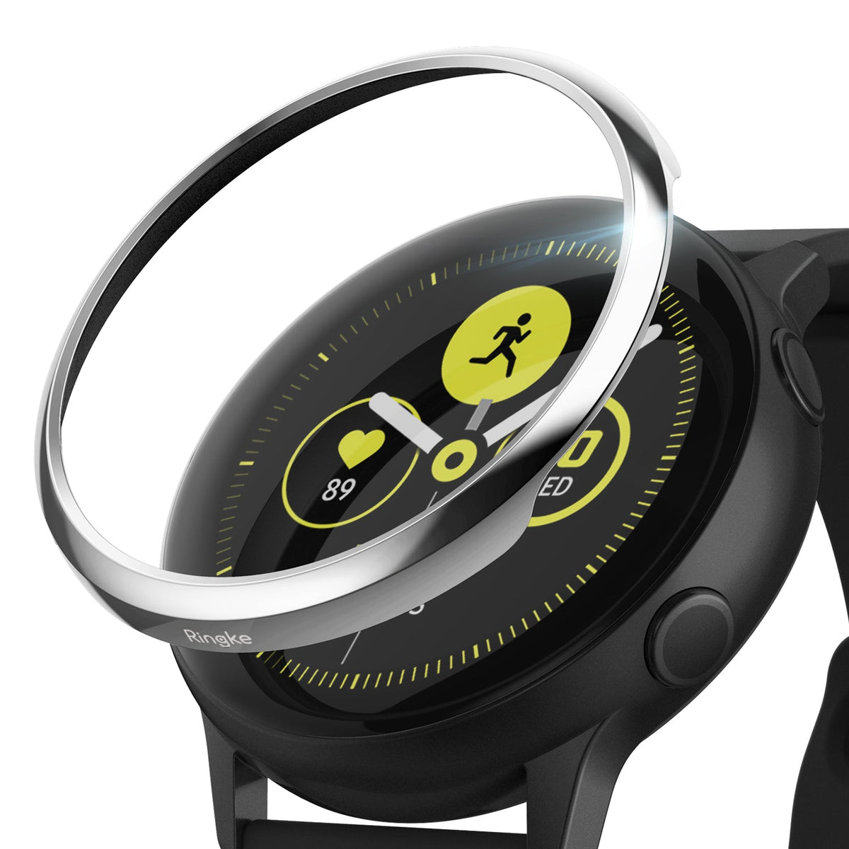 Galaxy Watch Active | Bezel Styling - A silver metal bezel accessory hovering above a black Galaxy Watch Active.