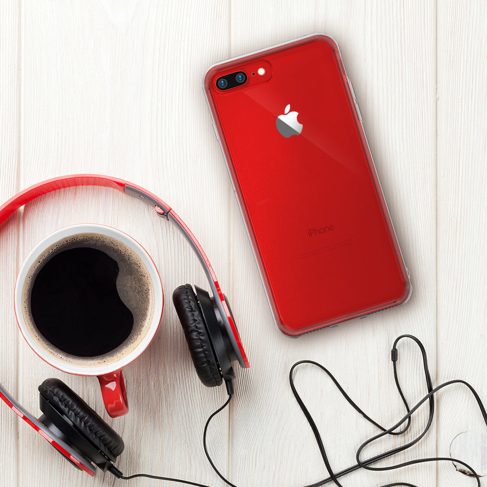 iPhone 8 Plus / 7 Plus Case | Fusion - Red iPhone in a clear case next to a coffee mug and red headphones on a white wood table.