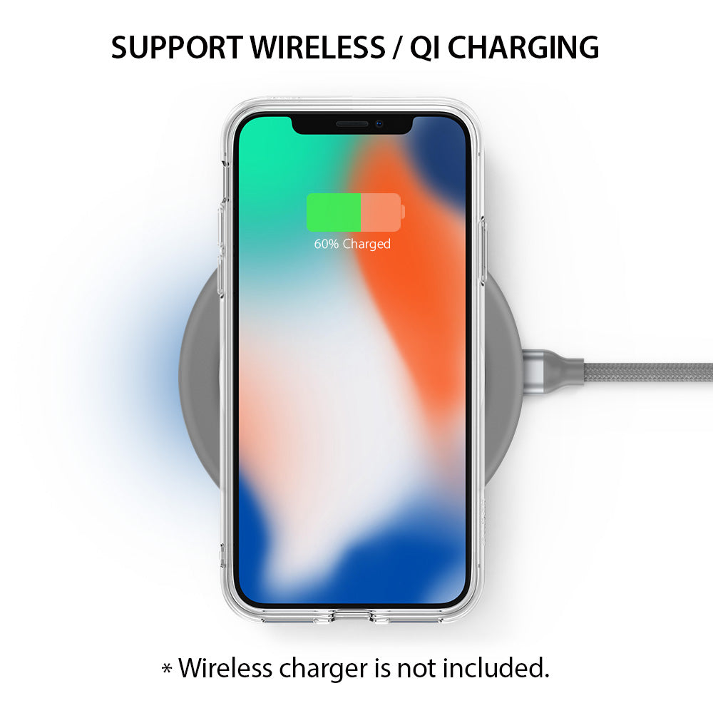 iPhone X Case | Fusion - Clear phone case on a wireless charging pad showing a 60% battery charge icon on the screen.