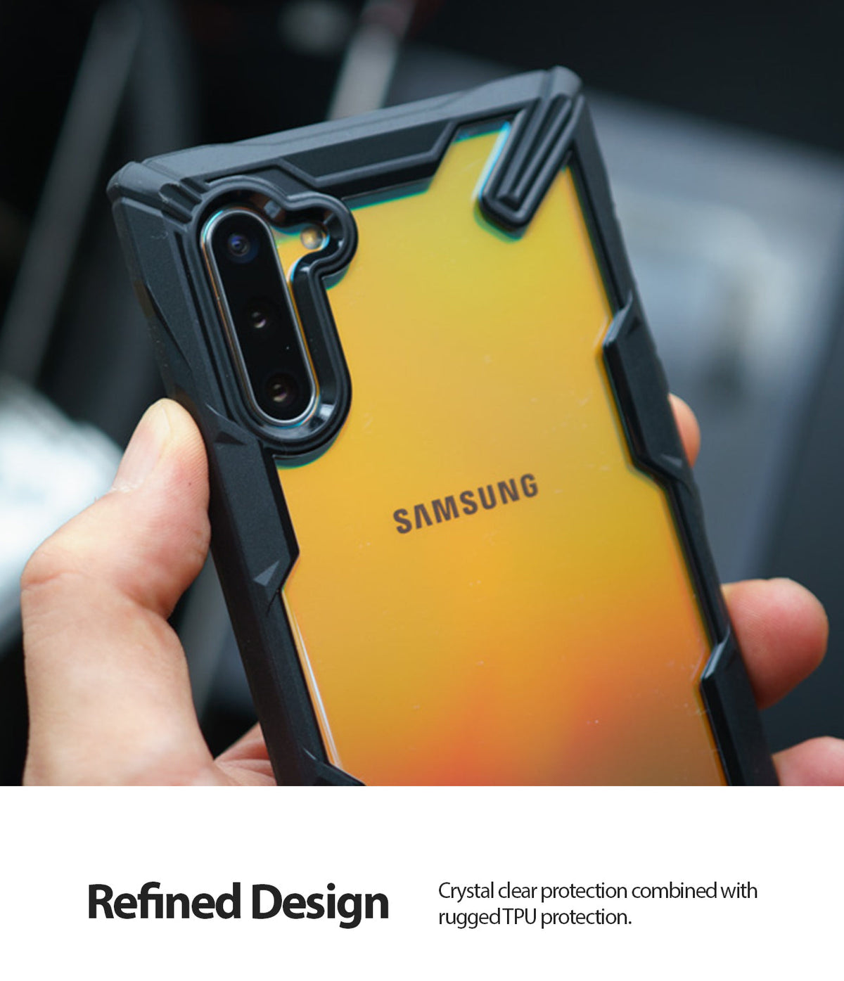 Galaxy Note 10 Case | Fusion-X - A hand holding a Samsung Galaxy Note 10 in a black, rugged Fusion-X case with a clear back.