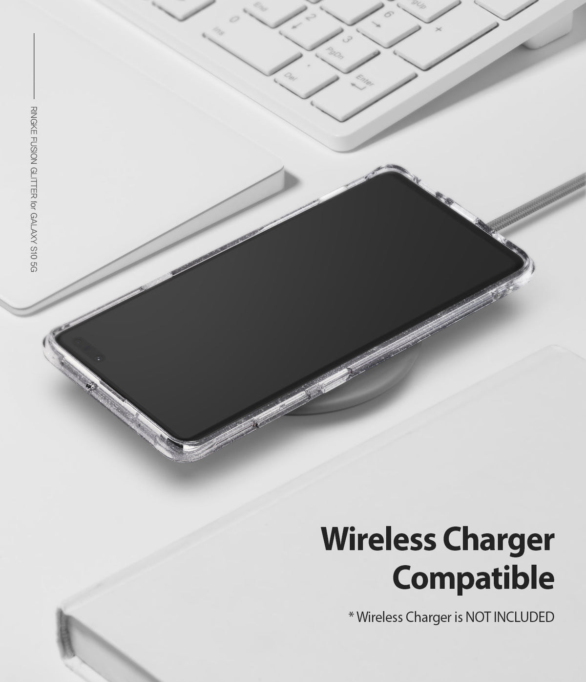 Galaxy S10 5G Case | Fusion - A glitter clear phone case on a Galaxy S10 5G resting on a wireless charger on a white desk.