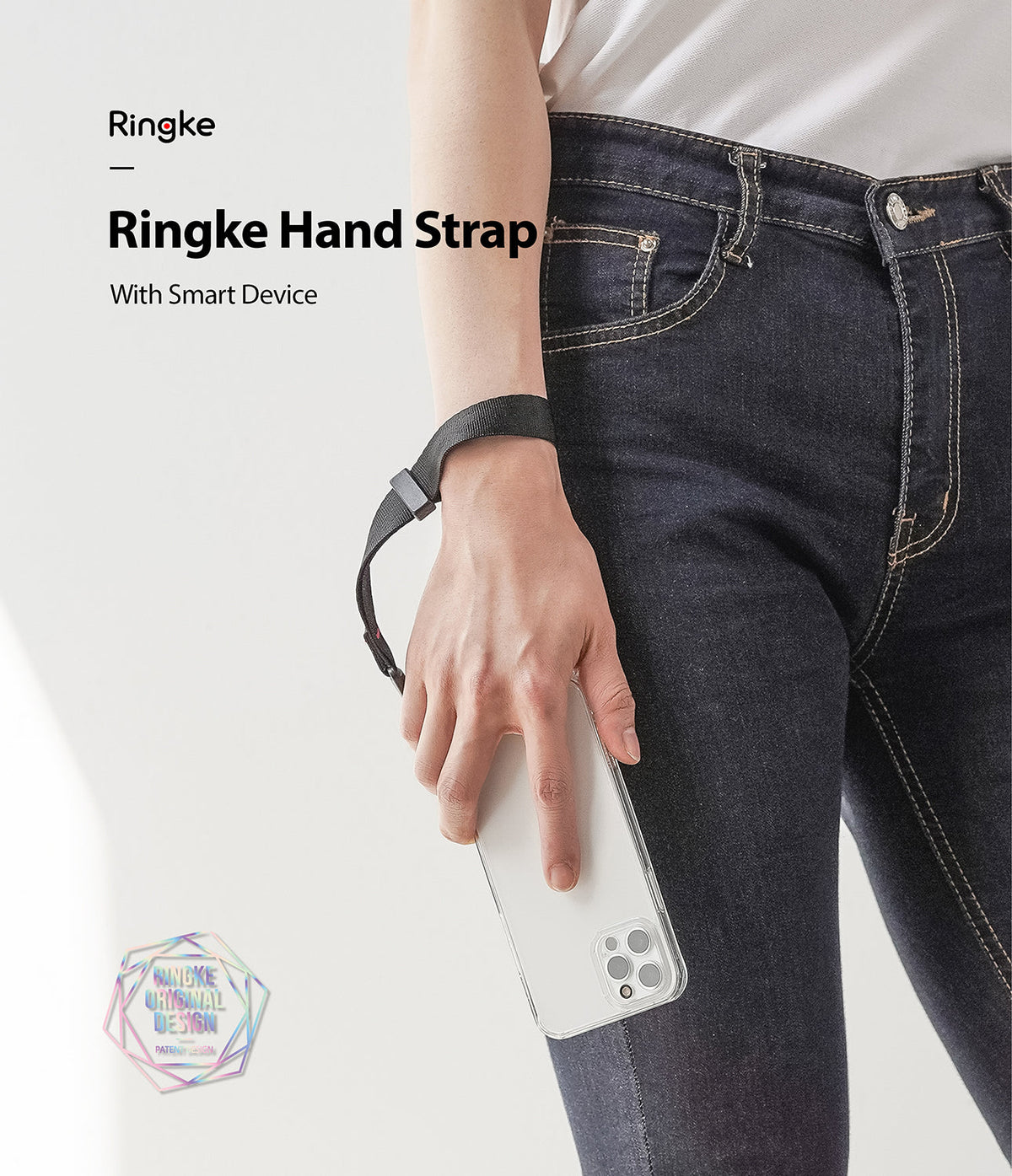 Hand Strap | Black / Neon Orange - A person wearing a black wrist strap attached to a smartphone held in their hand.