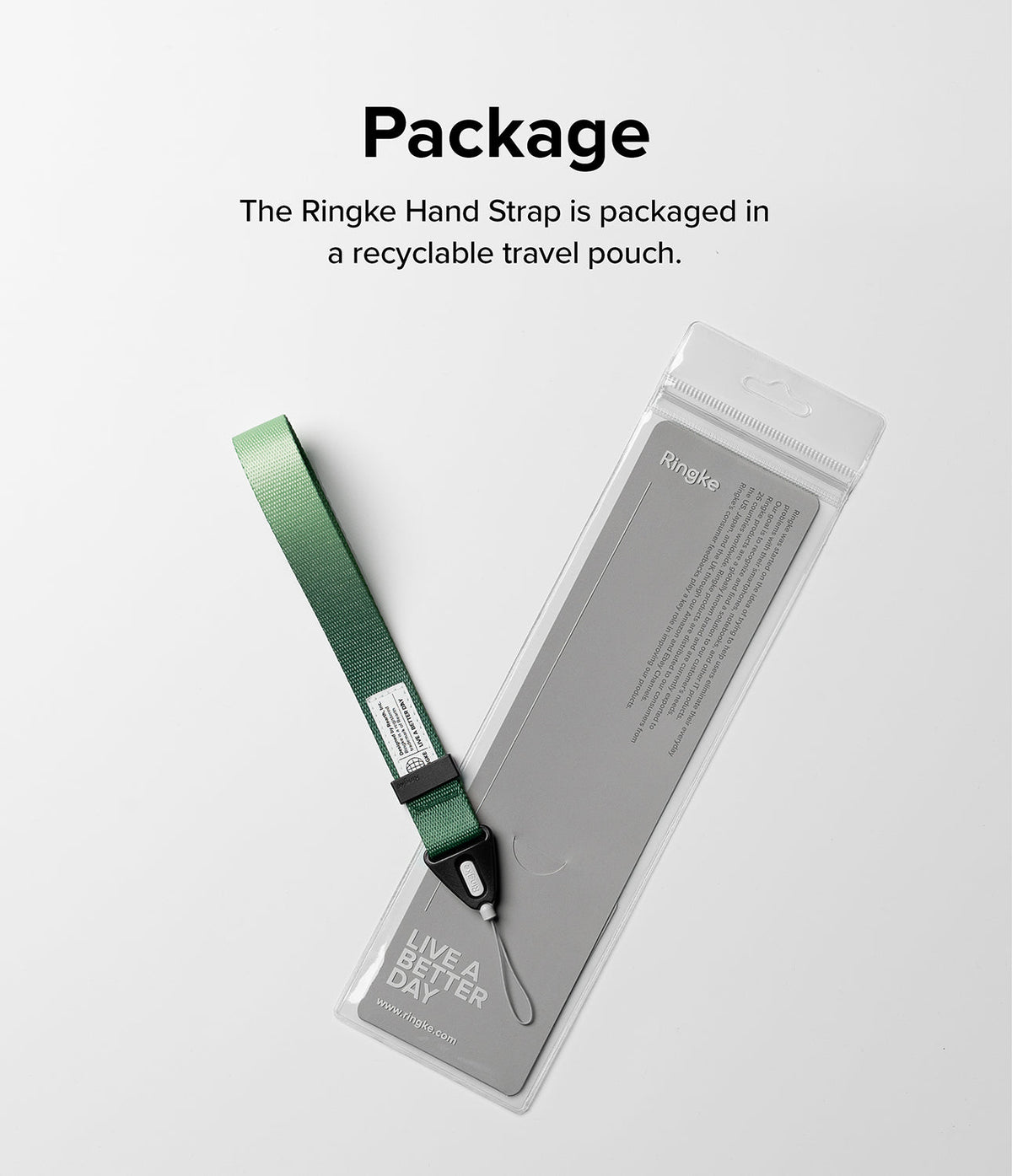Hand Strap | Basic - A green fabric hand strap with a black connector inside a clear, branded recyclable travel pouch.