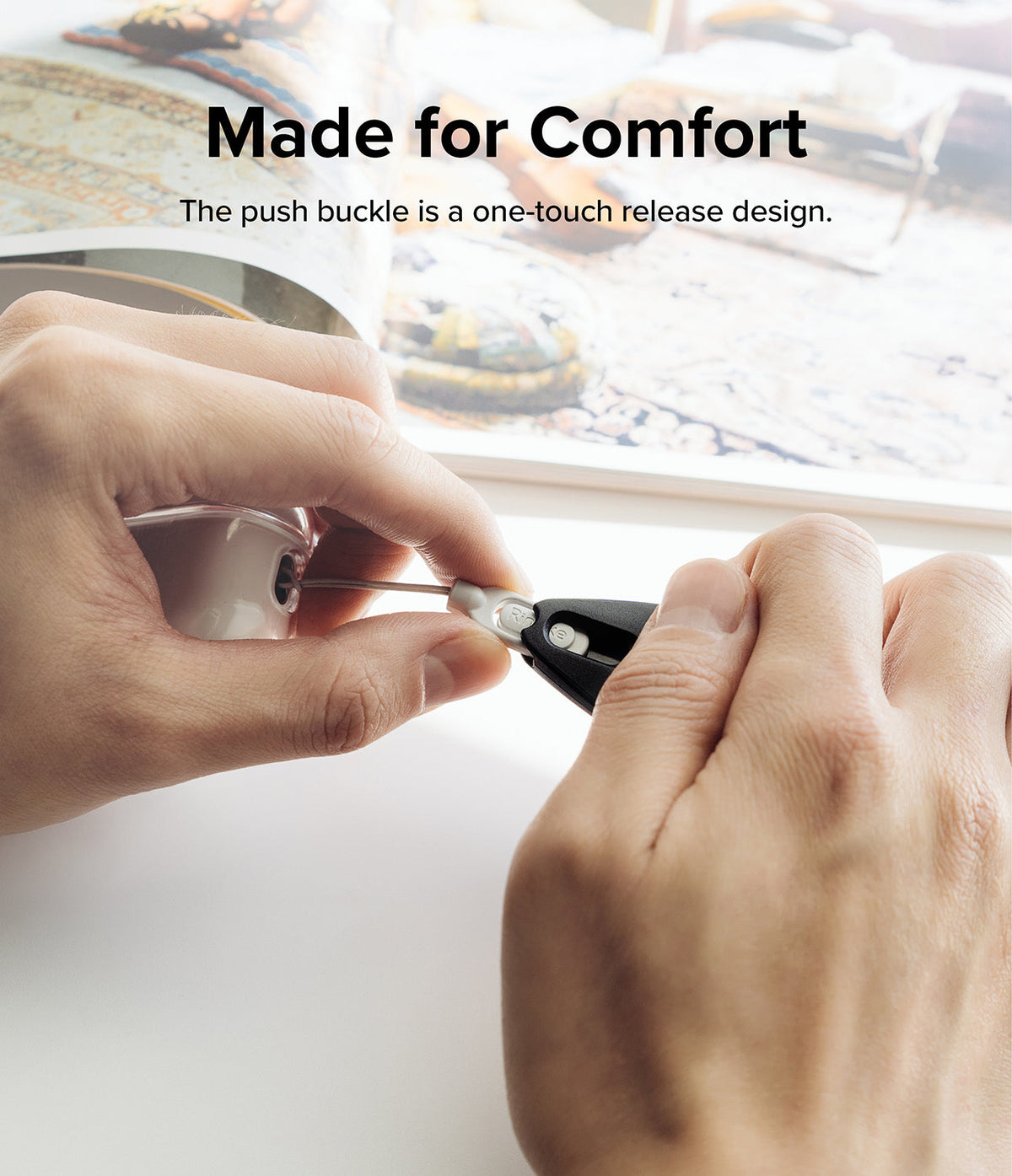 Hand Strap | Basic - Hands demonstrating the one-touch push buckle release mechanism on a phone strap.