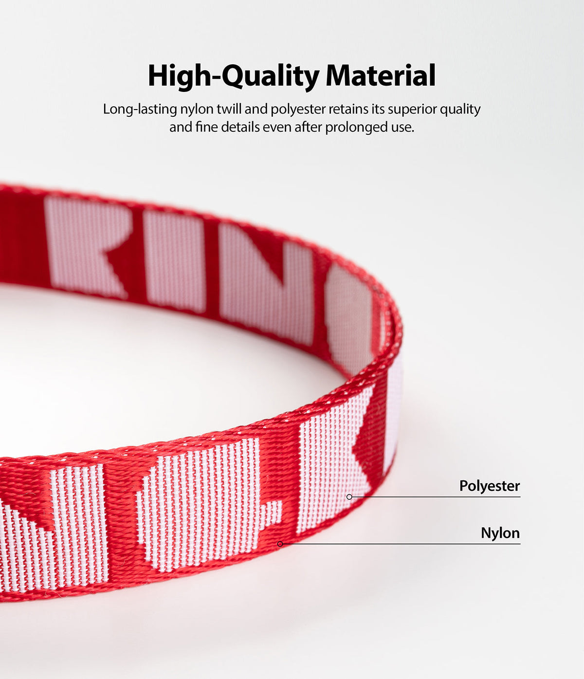 Hand Strap | Lettering - Close-up of a red and white woven nylon and polyester strap with branded lettering.