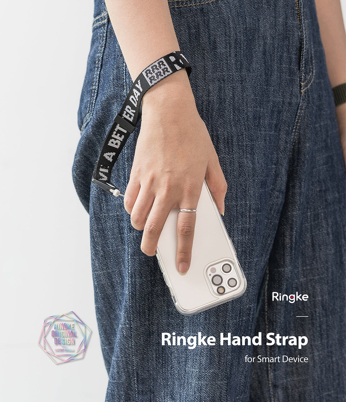 Hand Strap | Lettering - A person wearing a black wrist strap with white text around their wrist while holding a smartphone.