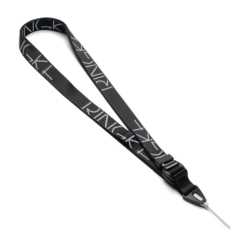 Design Lanyard Strap - Black fabric lanyard with white repeating Ringke logo, featuring a quick-release buckle and thin loop.