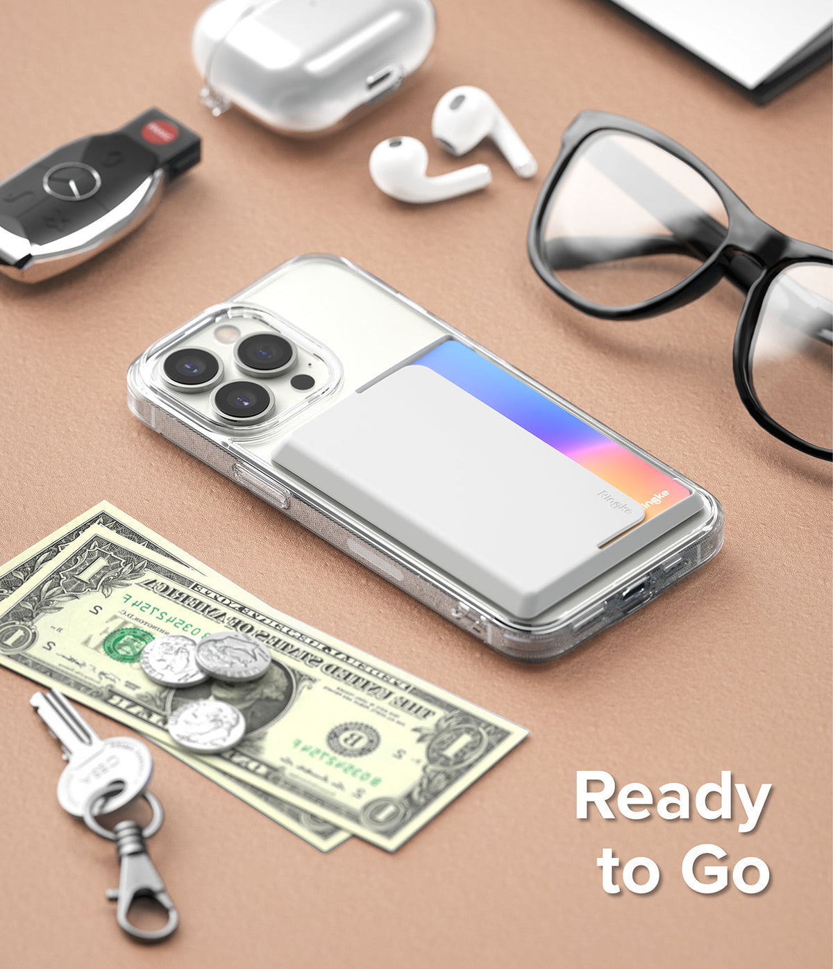 Card Holder | Side Slot - Smartphone with white card holder attached, surrounded by keys, cash, coins, earbuds, and glasses.