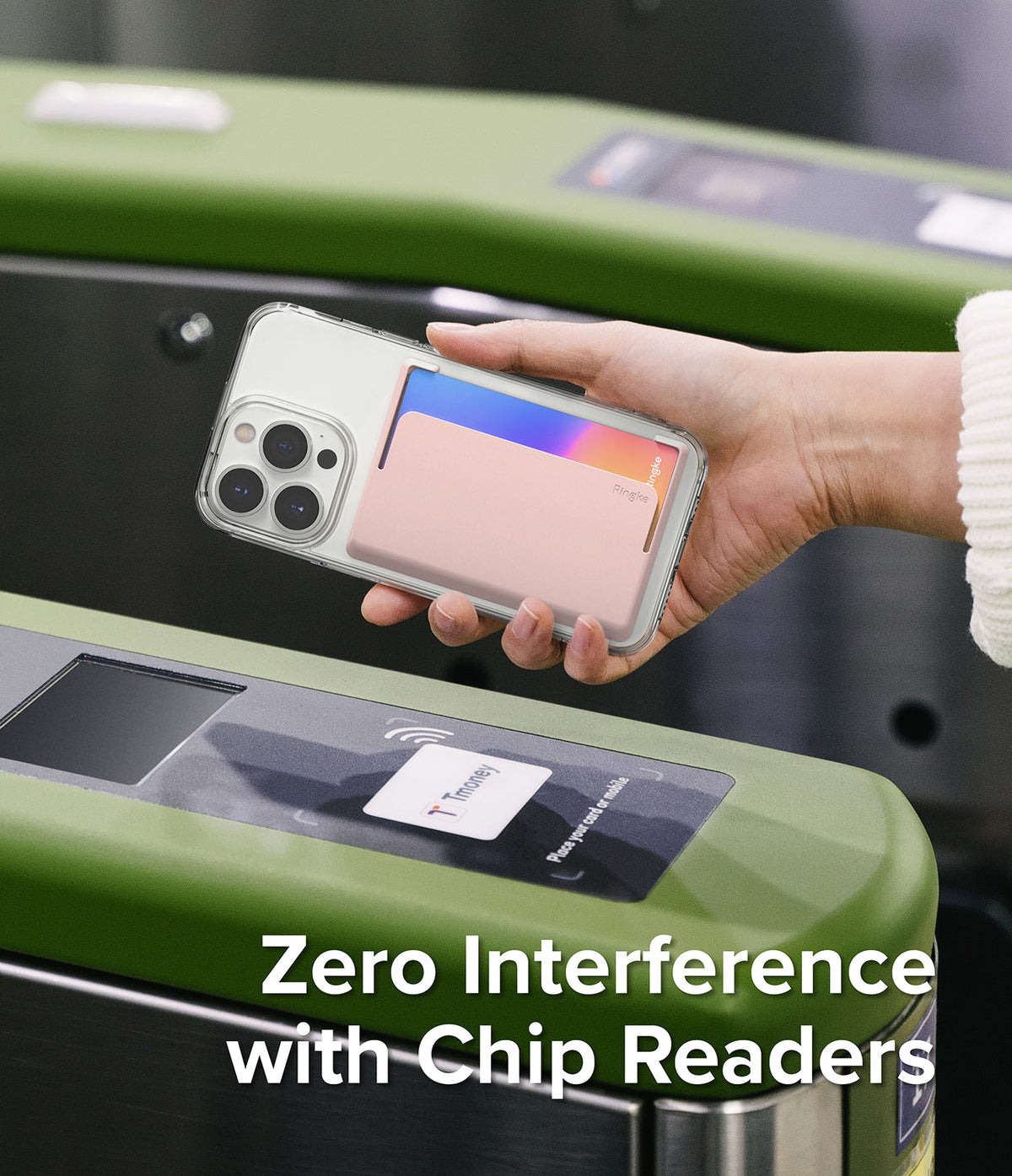 Card Holder | Side Slot - A hand holds a phone with a pink card holder over a subway turnstile chip reader.