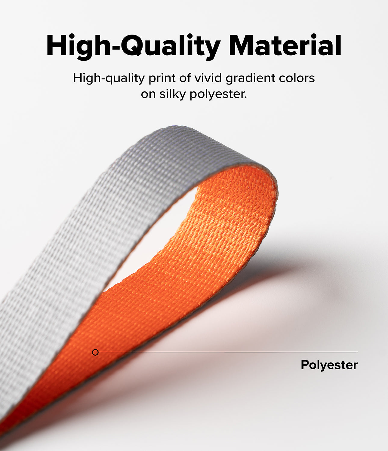 Design Shoulder Strap - A close-up of a folded polyester strap with a grey exterior and a vibrant orange interior.
