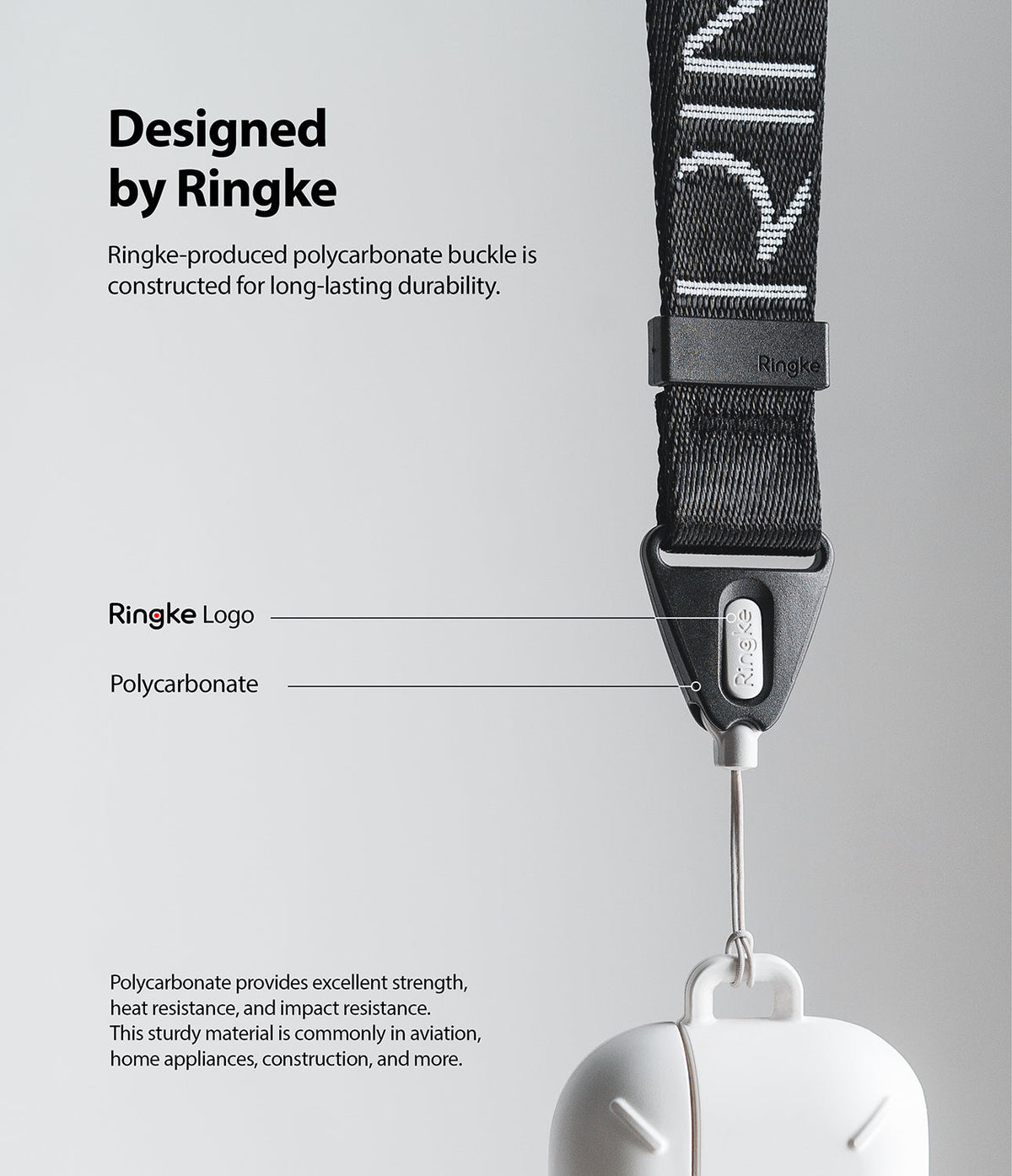 Design Shoulder Strap - Close-up of a black Ringke shoulder strap with a durable polycarbonate buckle attached to a white case.