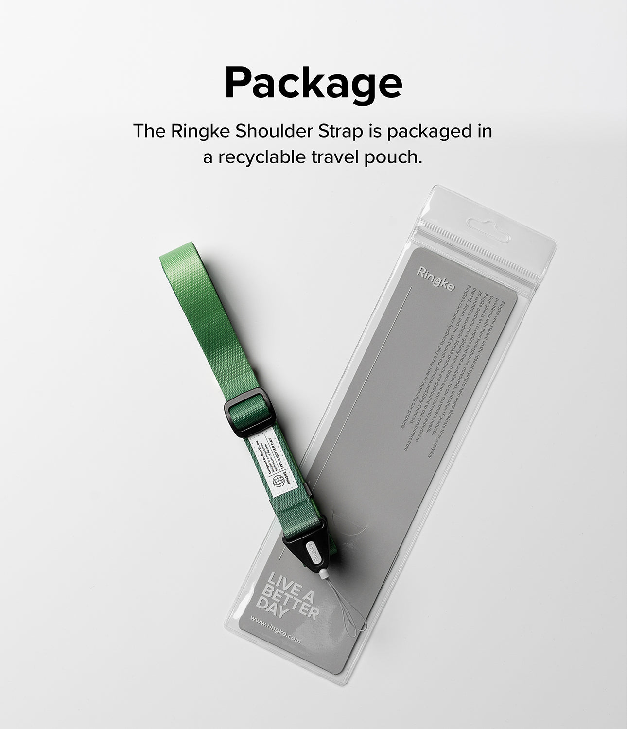Design Shoulder Strap - A green fabric strap with a black buckle resting next to its clear, branded recyclable travel pouch.