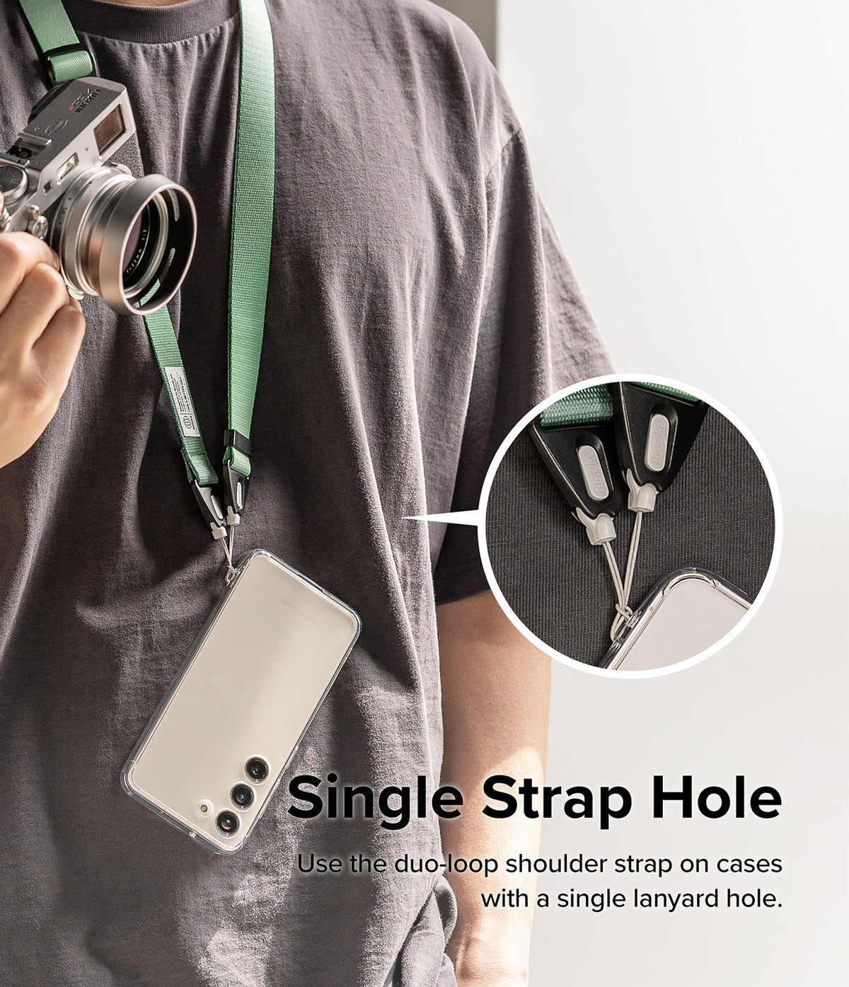 Design Shoulder Strap - A green lanyard attached to a phone case with a single hole via a duo-loop connector.