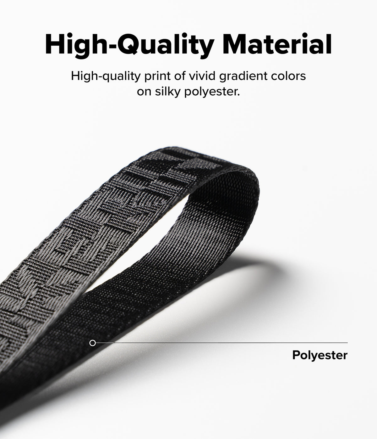 Shoulder Strap | Lettering - Close-up of a black polyester strap with woven lettering, labeled as high-quality material.