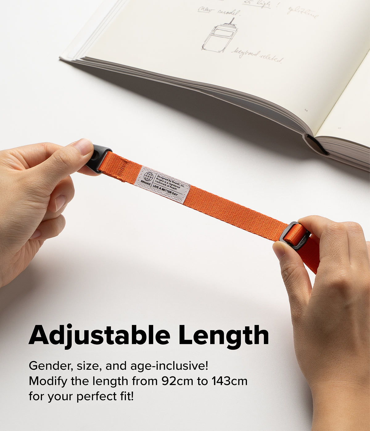 Shoulder Slim Strap - Hands holding an adjustable orange nylon strap with a Ringke brand tag against a white background.