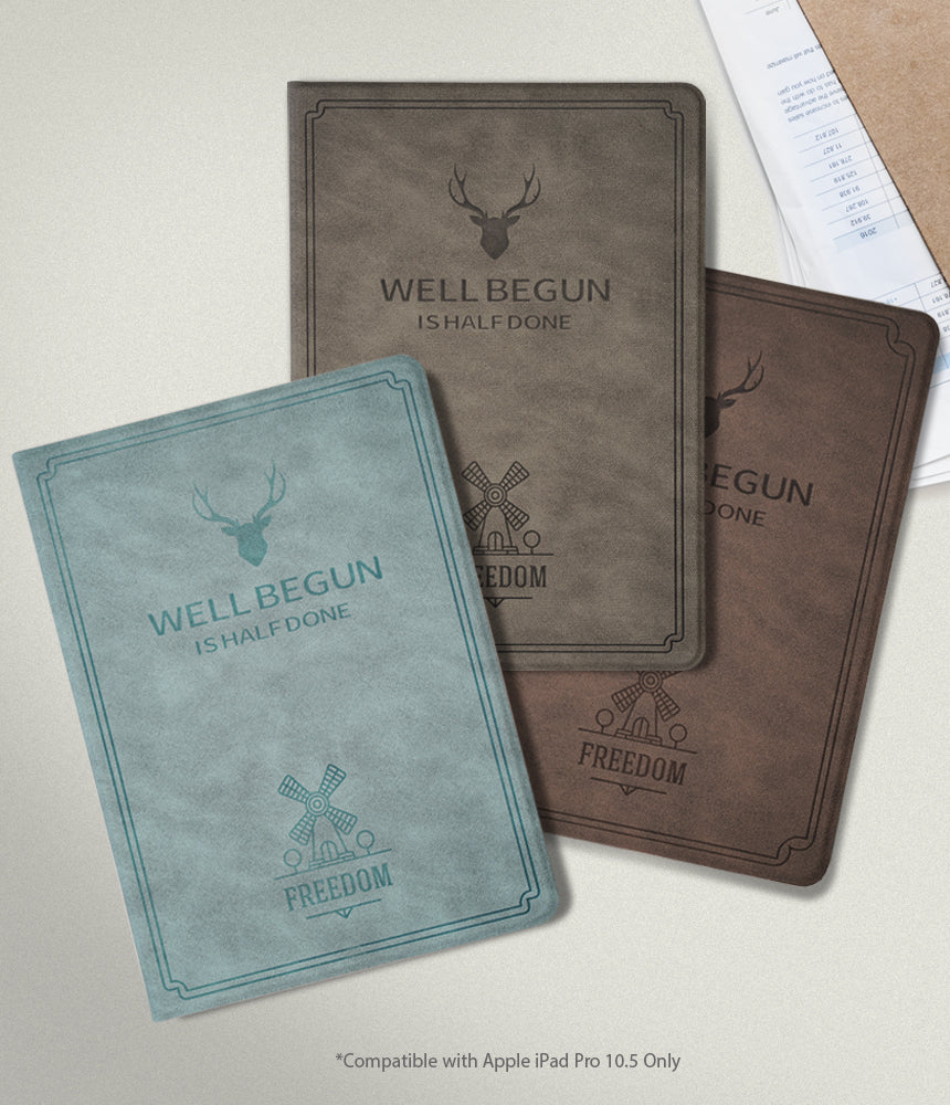 Smart Cover Design Leather Stand | iPad - Smart Cover Design Leather Stand - Three leather iPad cases in blue, grey, and brown with deer and windmill motifs.