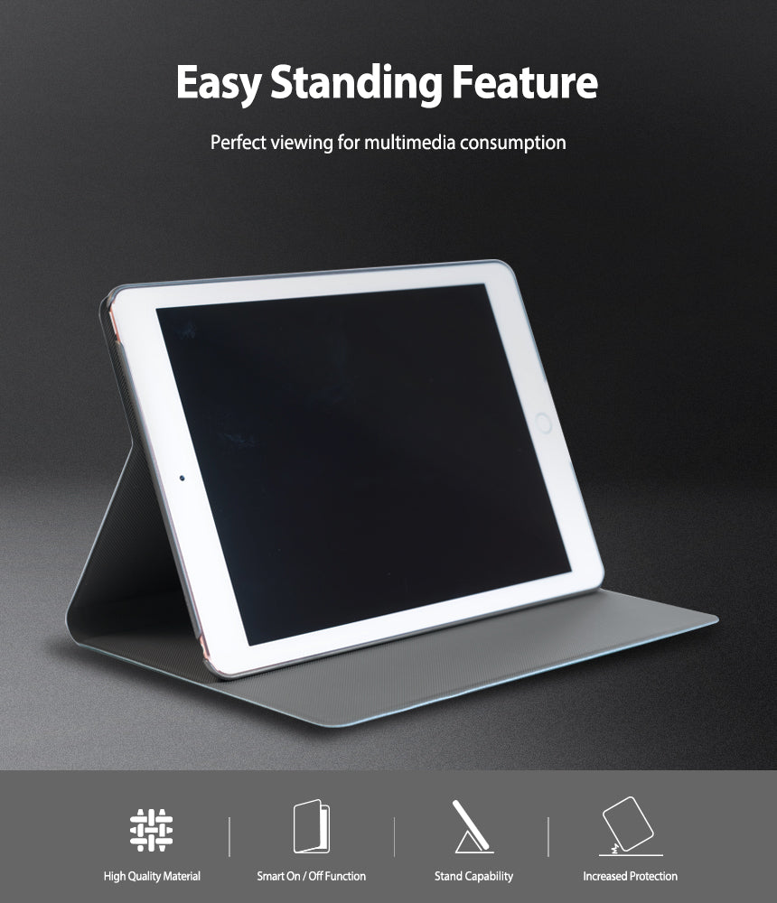 Smart Cover Design Leather Stand | iPad - An iPad in a grey leather case folded into a stand on a dark background.