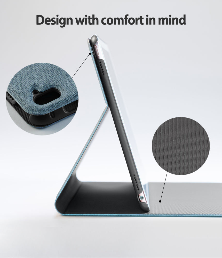 Smart Cover Design Leather Stand | iPad - Side view of an iPad in a blue textured stand case with zoomed-in material details.