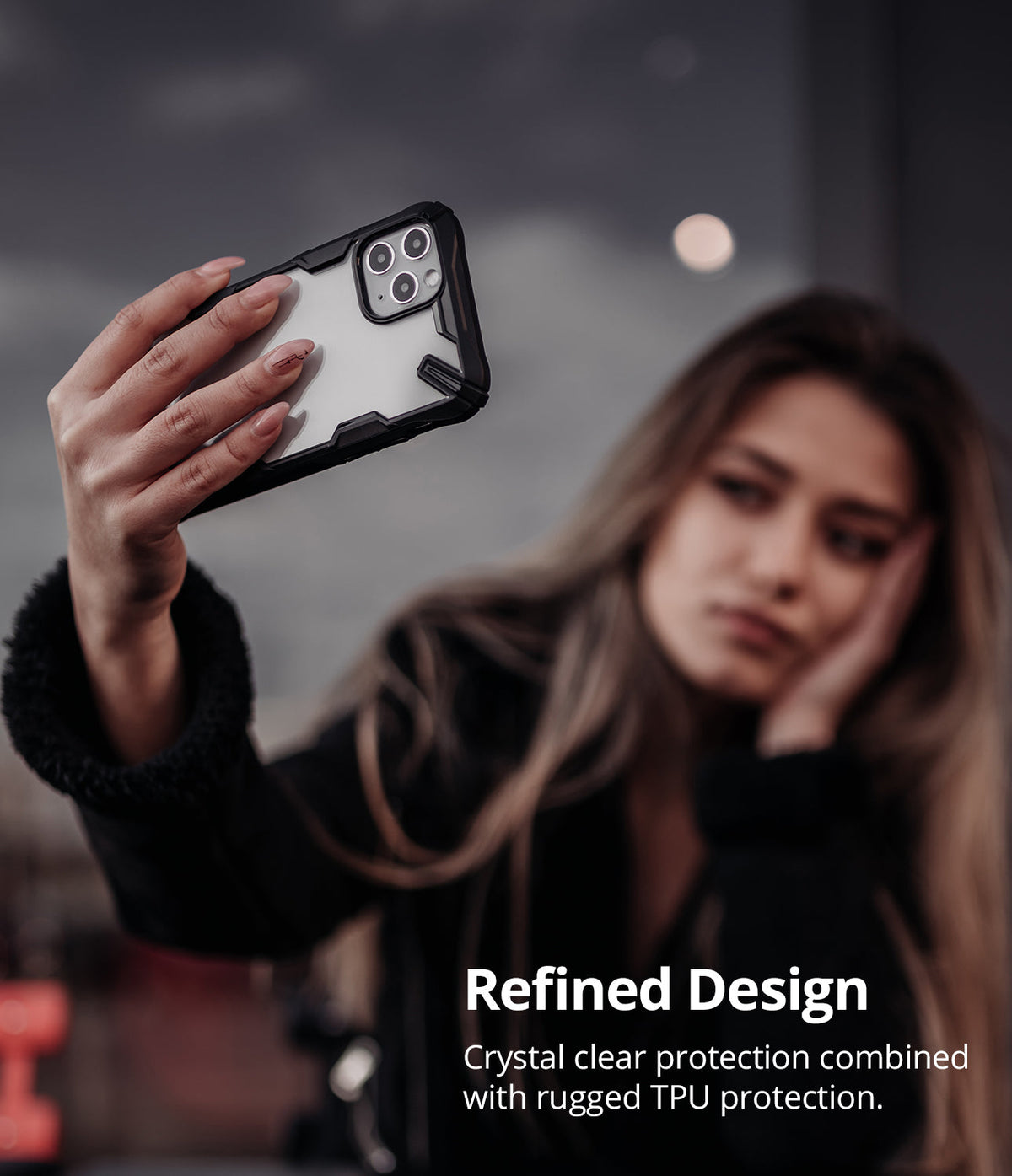 iPhone 11 Pro Case | Fusion-X - Woman holding a clear and black rugged phone case for an iPhone 11 Pro to take a selfie.