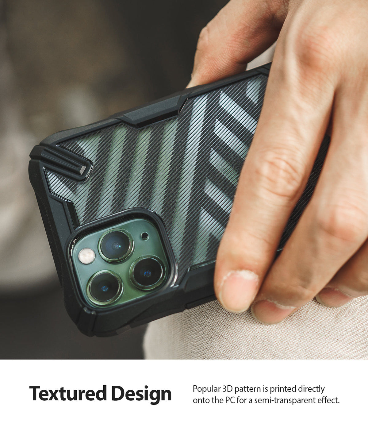 iPhone 11 Pro Max Case | Fusion-X Design - Hand holding a phone case with a black, semi-transparent diagonal stripe pattern.