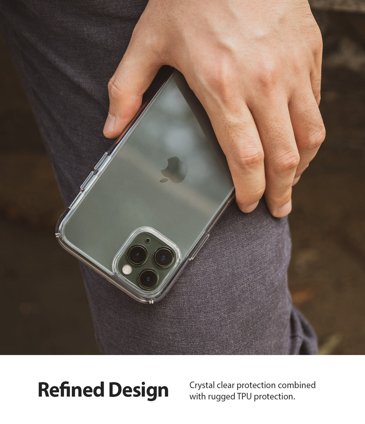 iPhone 11 Pro Max Case | Fusion - Hand holding a green iPhone 11 Pro Max in a clear protective case against a grey pant leg.