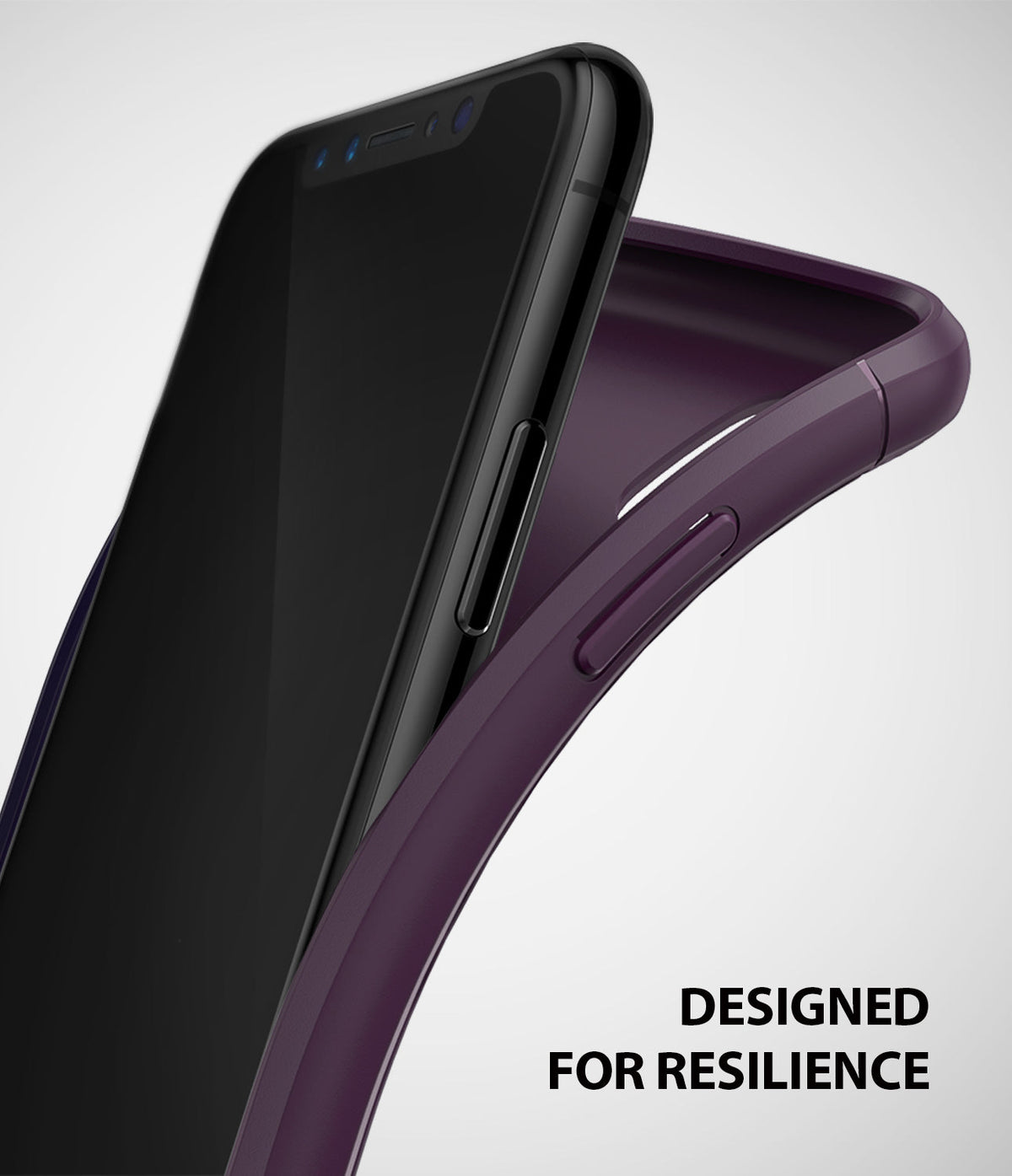 iPhone XS Case | Onyx - A black smartphone being inserted into a flexible, deep purple TPU protective case.