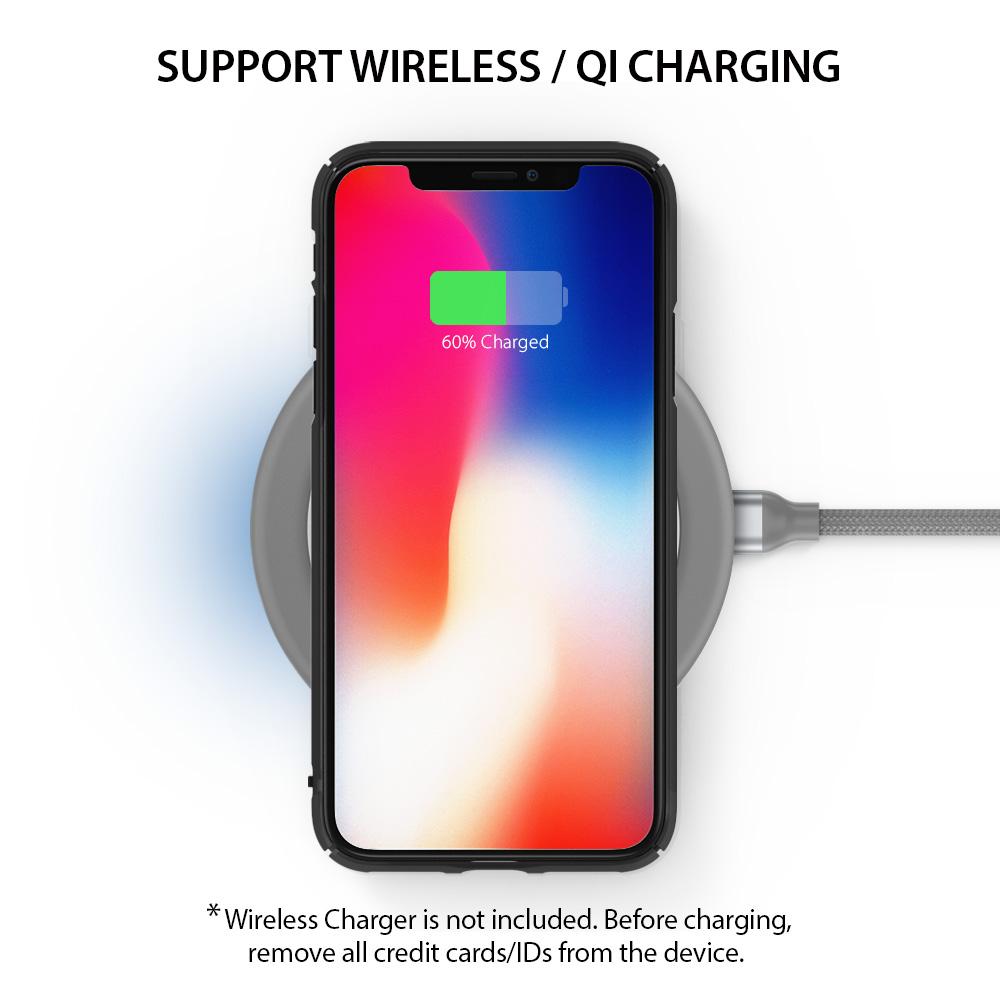 iPhone X Case | Slim + Slot Card Holder - Smartphone on a wireless charging pad showing a 60% battery charge icon.