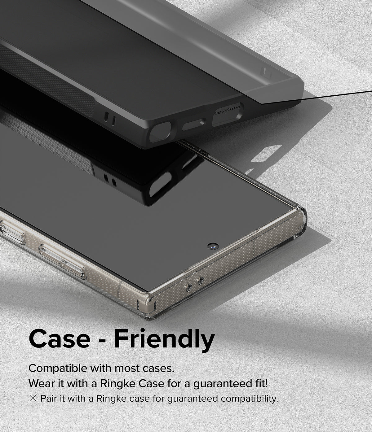 Galaxy S24 Ultra Screen Protector | Easy Slide Tempered Glass - Galaxy S24 Ultra Screen Protector - Tempered glass screen protector being applied to a smartphone inside a protective case.