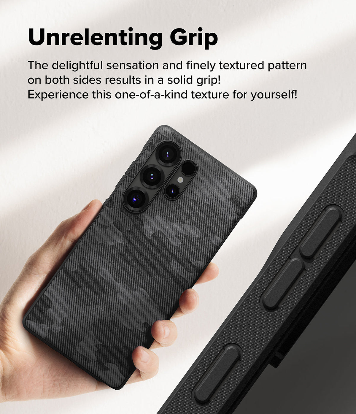 Galaxy S25 Ultra Case | Onyx - Hand holding a black camo-patterned phone case with a textured grip and camera cutouts.